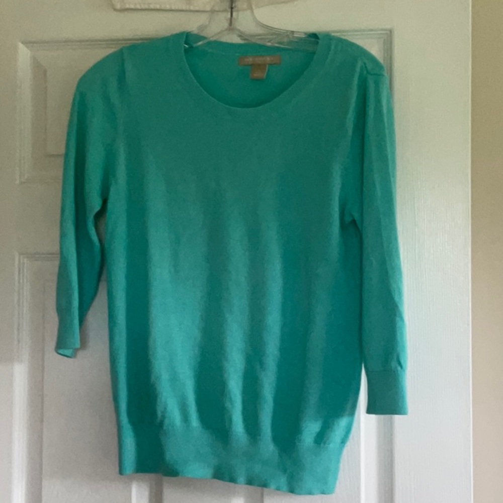 Banana Republic teal knit sweater.  Sleeves are 3/4 length.